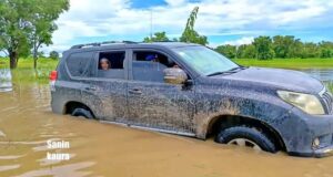 Wife Of Bauchi Governor Trapped On Bad Road In The State, Forced To Walk In Mud Water