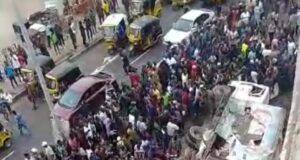 Truck Falls Off Bridge, Crushes Two Buses In Lagos