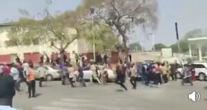 BREAKING: Tension In Abuja As Aggrieved Workers Confront Wike’s Convoy