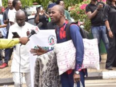 Electoral Act Protester Spotted With Mattress, Pillow